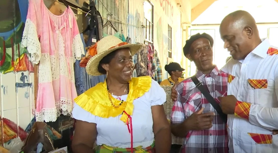 Prime Minister Roosevelt Skerrit with locals of Dominica