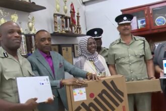 Rayburn Blackmoore observed the donation of electronic equipment