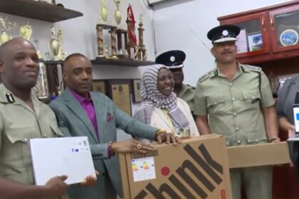 Rayburn Blackmoore observed the donation of electronic equipment