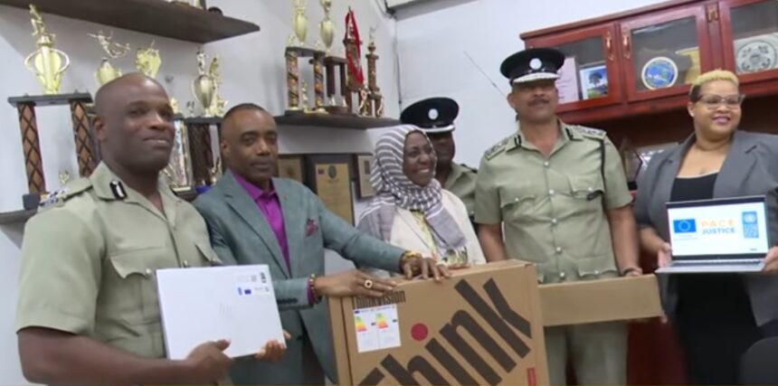 Rayburn Blackmoore observed the donation of electronic equipment