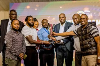 KARGOPAY team of Kenya while receiving the winning trophy at AAPAM