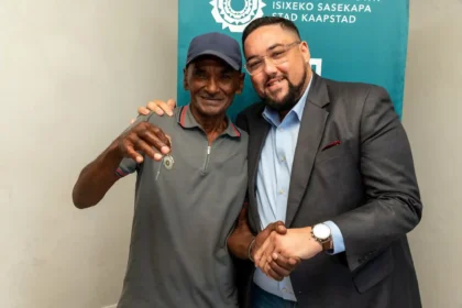 Carl Pophaim with Edward Avenue beneficiaries in Cape Town