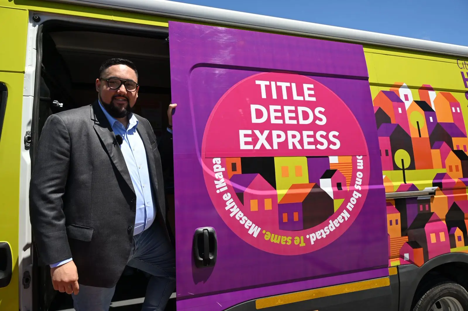 Cllr Carl Pophaim in Title Deeds Express Bus, Cape Town