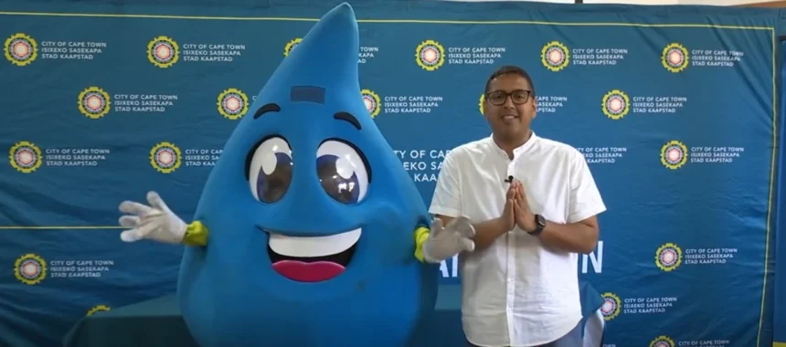 Councillor Zahid Badroodien with Water and Sanitation Mascot - Mzansi of Cape Town