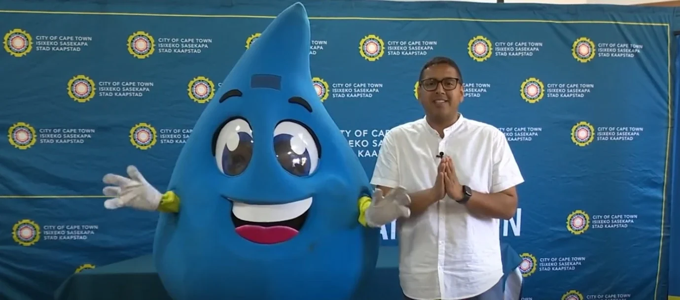 Councillor Zahid Badroodien with Water and Sanitation Mascot - Mzansi of Cape Town