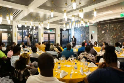 Dominica Prime Minister Roosevelt Skerrit while engaging with beekeepers and pepper sauce producers