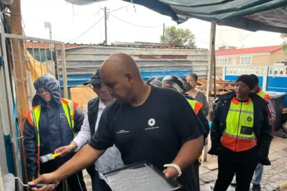 Deputy Mayor Eddie Andrews with MURP and Atterbury team observing house painting project in Uitsig, Cape Town