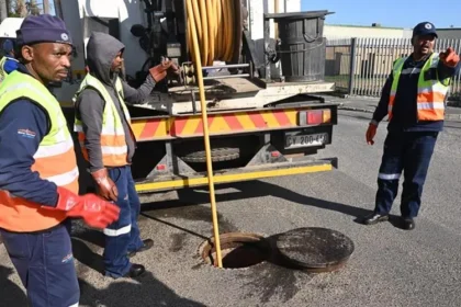 Cape Town Water and Sanitation team cleaning the sewer