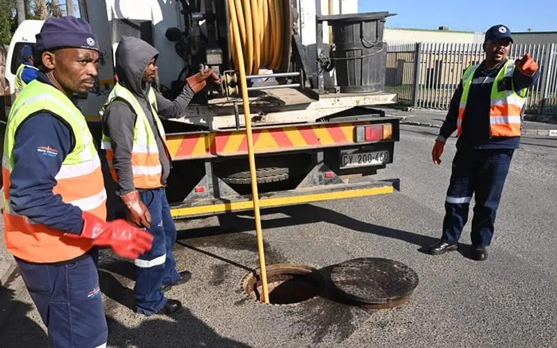 Cape Town Water and Sanitation team cleaning the sewer