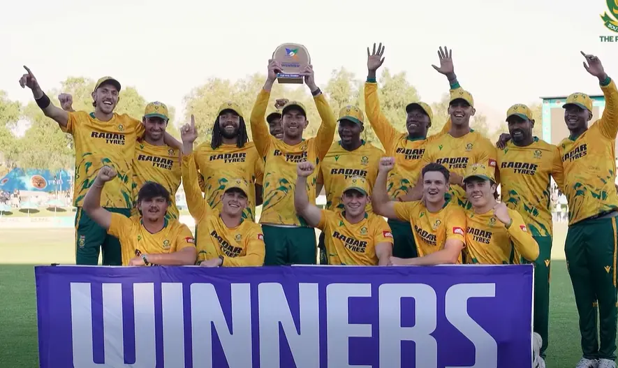 South Africa Men’s Cricket’s team won the 2026 Namibia T30I Tri-Series Final against the Zimbabwe Men’s Cricket Team on September 6, 2026. The team won the match by 48 runs after scoring 205 runs in 20 overs for a loss of 5 wickets.   The toss was won by the South Africa team and they chose to bat first. Conor Esterhuizen and Jordan Hermann opened the innings for the team. Esterhuizen scored 32 runs in 23 balls and Hermann scored the highest runs for the team 53 runs in 29 balls in which he hit 8 fours and 1 six in the match. The three players who contributed to the final score of the team were: Dewald Brevis 32 in 23 balls, Tony De Zorzi 17 runs in 11 balls, Rubin Hermann 27 runs in 16 balls, Eathan Bosch 7 runs in 4 balls and Duan Jansen 23 runs in 14 balls. The wickets of the South Africa Team were dismissed by the three Zimbabwe players Newman Nyamhuri 2, Brad Evans 2 and Sikandar Raza 1.  Moreover, South Africa’s bowlers bowled out Zimbabwe for 157 runs in 17.5 overs. The highest runs scored by the Zimbabwe team came from the player Brad Evans who hit 56 runs in 31 balls in which he hit 4 fours and sixes. Duan Jansen and Bjorn Fortuin were the highest wicket takers for the South Africa team. Both the players dismissed three wickets. Eathan Bosch also took two wickets while Kwena Maphaka and Prenelan Subrayen each took one wicket against Zimbabwe players. Moreover, the title of player of match and player of the series were secured by the South Africa players. Jordan Hermann was the player of the match and the player of the series title was secured by Dewald Brevis. The final match was held at the Namibia Cricket Ground, Windhoek.  Notably, the Namibia T30I Tri-Series officially began on August 28, 2026 and the series features Namibia, South Africa and Zimbabwe.